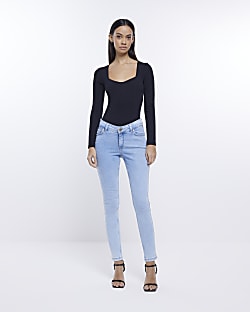Blue low rise skinny jeans