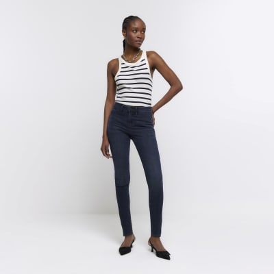 Blue mid rise bum sculpt skinny jeans | River Island