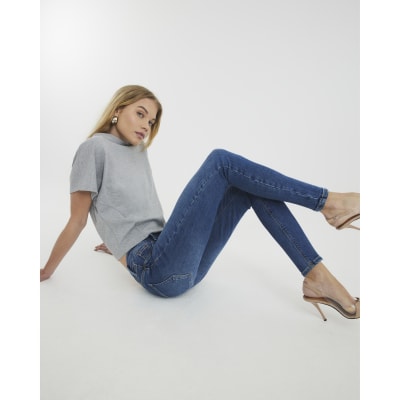 Blue mid rise bum sculpt skinny jeans River Island