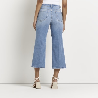 Blue mid rise cropped flared jeans River Island