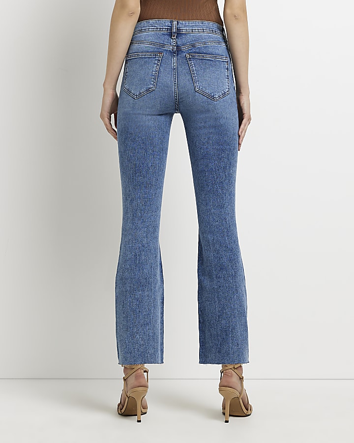 Blue mid rise cropped flared jeans