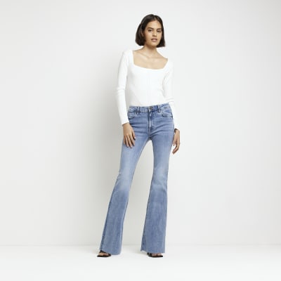 Blue Mid Rise Flared Jeans | River Island
