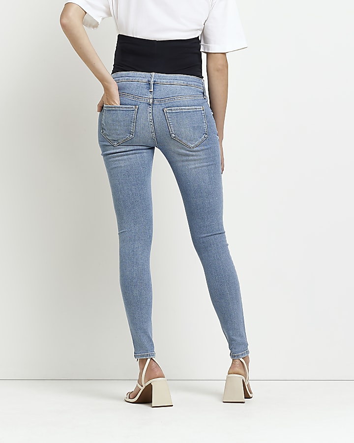 Blue mid rise maternity ripped skinny jeans