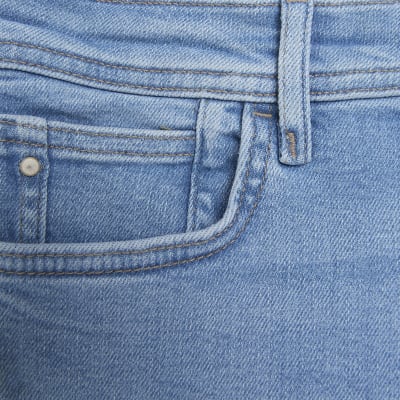 Blue mid rise skinny jeans