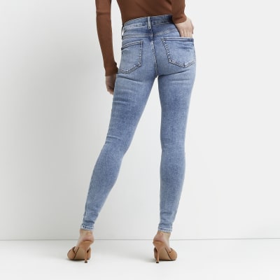 Blue mid rise skinny jeans