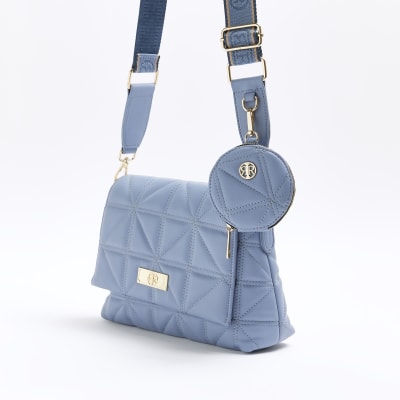 Blue quilted cross body bag | River Island