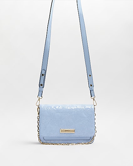 Blue quilted cross body bag