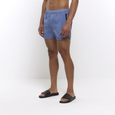 Blue regular fit iridescent swim shorts River Island