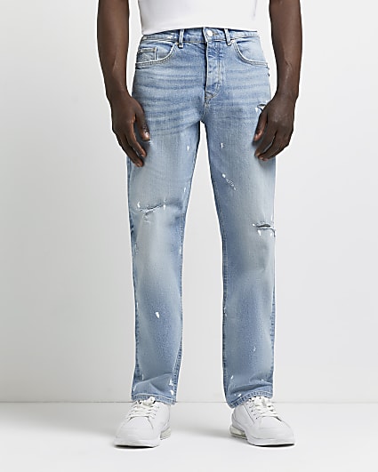 Blue relaxed fit ripped paint splat jeans