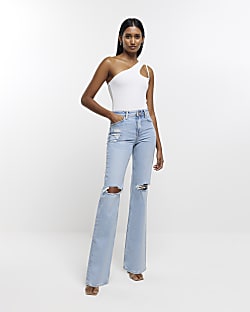 Blue relaxed straight ripped jeans