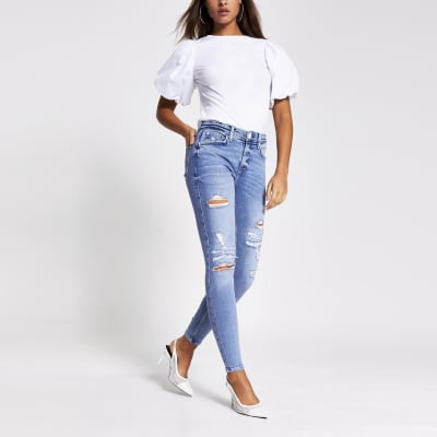 Blue ripped Amelie mid rise skinny jeans | River Island