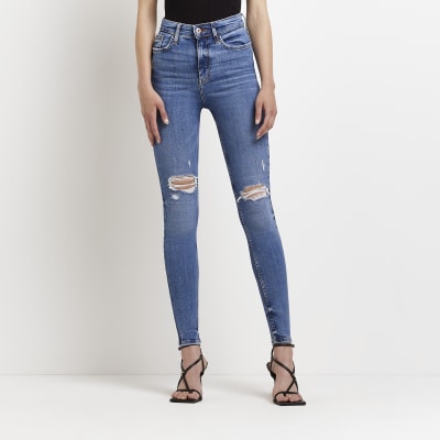 high waisted blue ripped skinny jeans