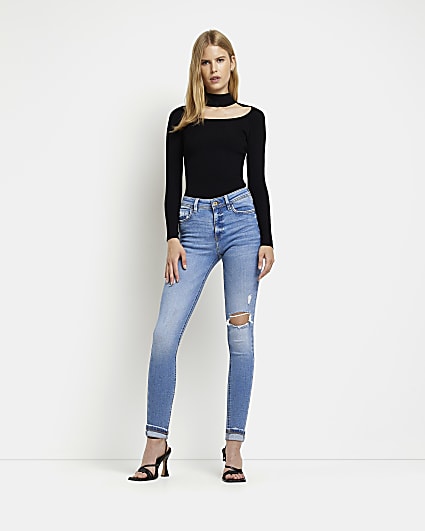 Blue ripped low rise skinny jeans