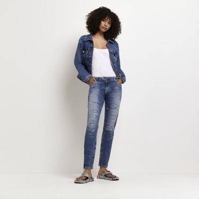 Blue ripped low rise skinny jeans River Island