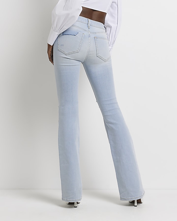 Blue ripped mid rise flared jeans