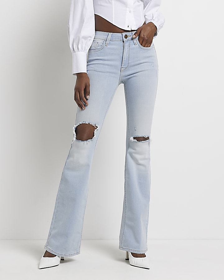 Blue ripped mid rise flared jeans