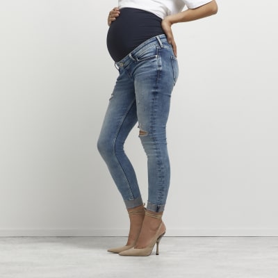 Blue ripped mid rise maternity skinny jeans | River Island