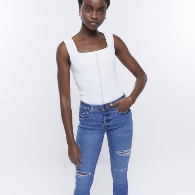 Blue ripped mid rise skinny jeans