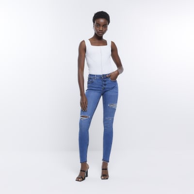 Blue ripped mid rise skinny jeans River Island