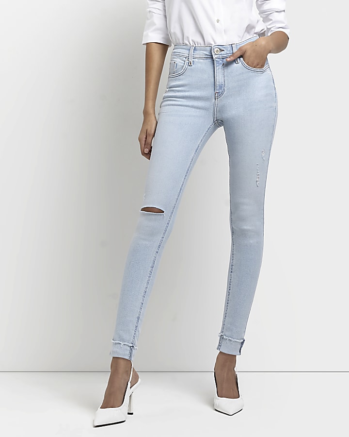 Blue ripped mid rise skinny jeans