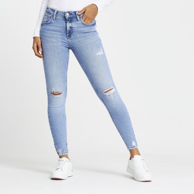 Blue ripped mid rise skinny jeans River Island