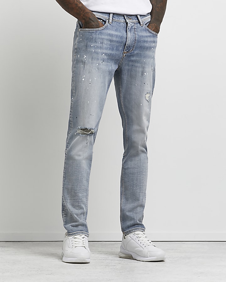Blue ripped paint relaxed skinny fit jeans