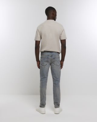 Blue ripped skinny jeans River Island