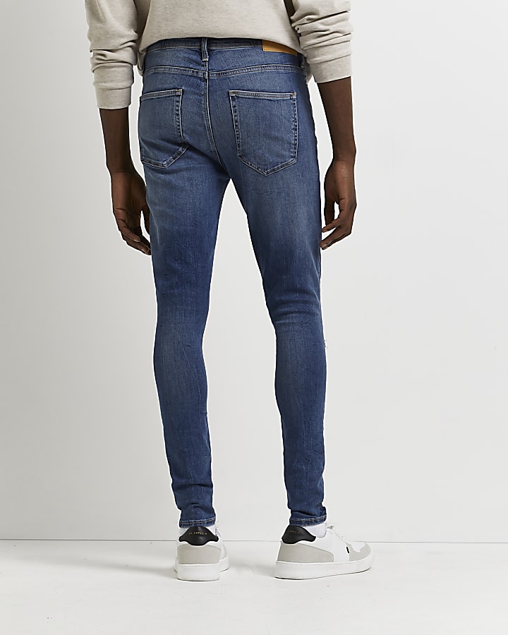 Blue ripped spray on super skinny fit jeans