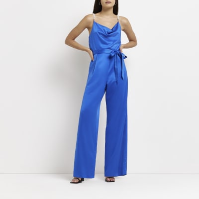 Blue satin cowl neck jumpsuit | River Island