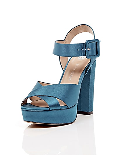 360 degree animation of product Blue satin cross strappy platform heels frame-1