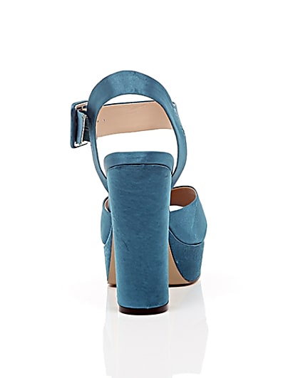 360 degree animation of product Blue satin cross strappy platform heels frame-15