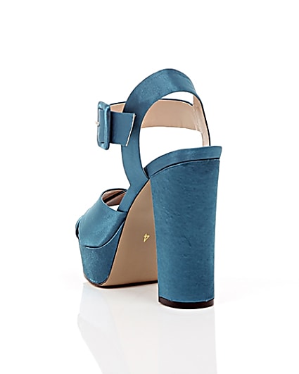 360 degree animation of product Blue satin cross strappy platform heels frame-17