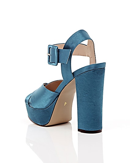 360 degree animation of product Blue satin cross strappy platform heels frame-18