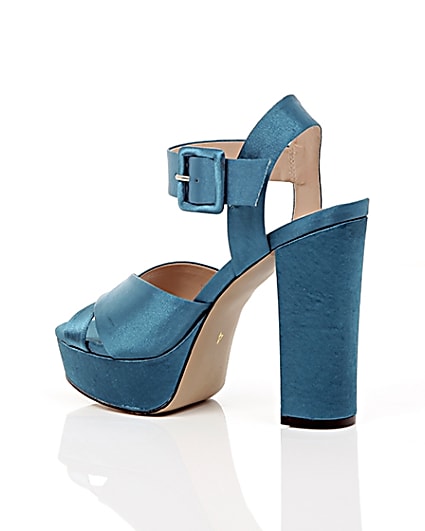 360 degree animation of product Blue satin cross strappy platform heels frame-19