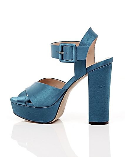 360 degree animation of product Blue satin cross strappy platform heels frame-20