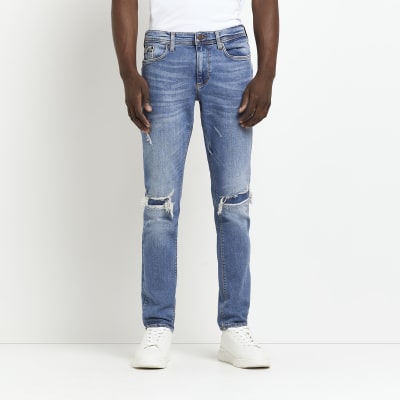 Blue Skinny fit ripped jeans | River Island