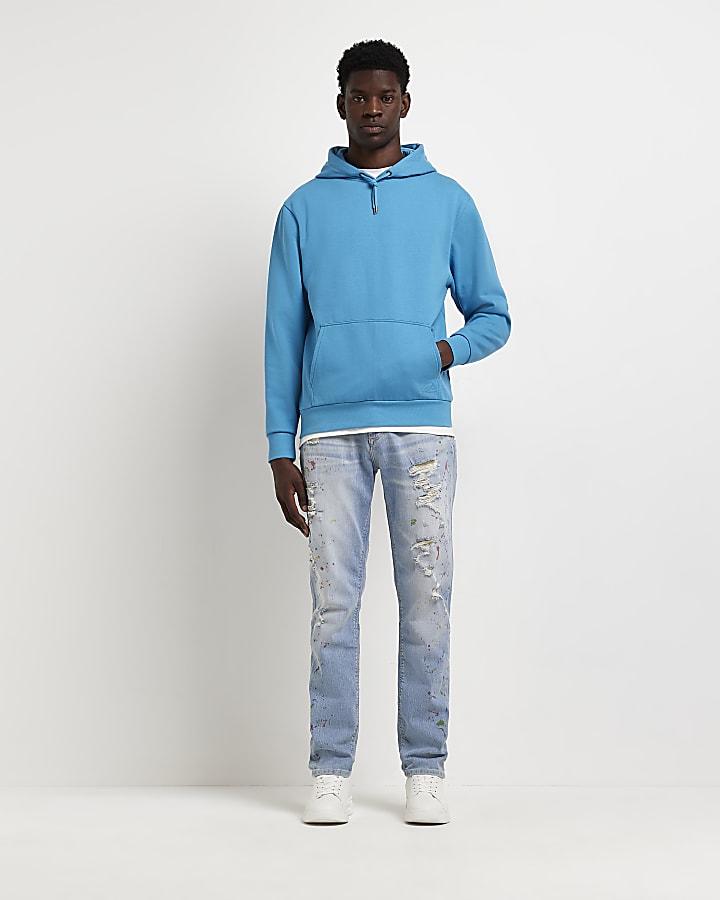 Blue skinny fit ripped paint spaltter jeans