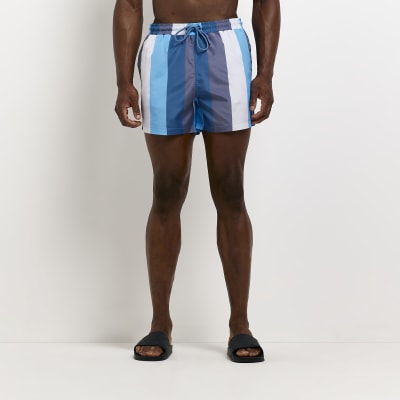 Blue skinny fit striped swim shorts