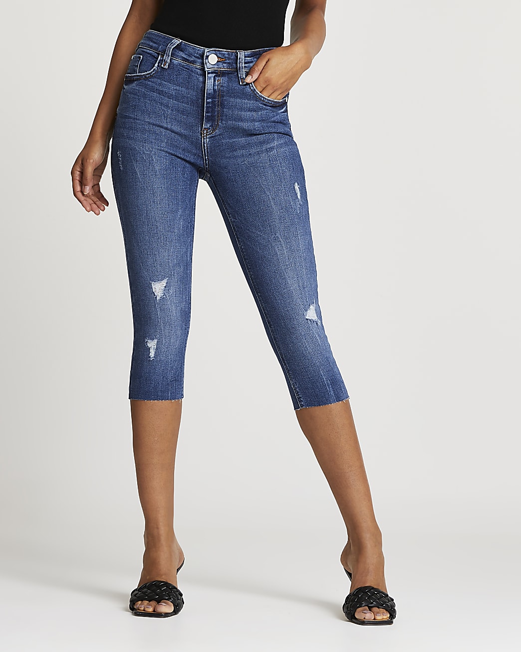 Blue skinny pedal pusher jeans