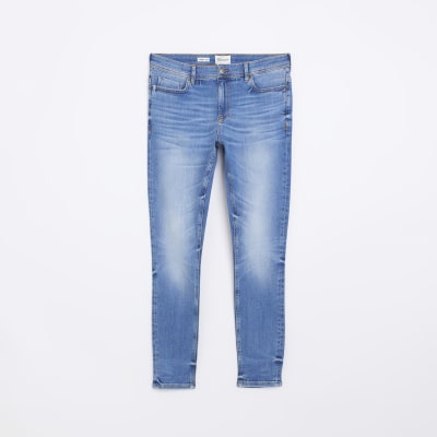 Blue spray on super skinny fit faded jeans
