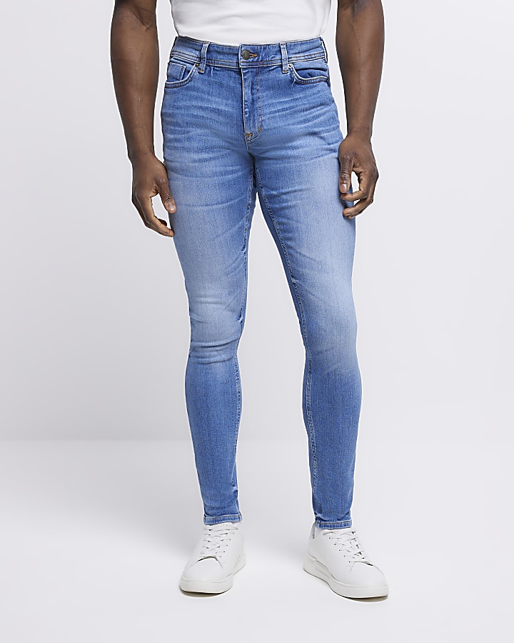 Blue spray on super skinny fit faded jeans
