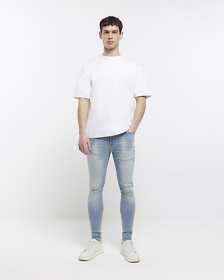 Blue spray on super skinny fit ripped jeans