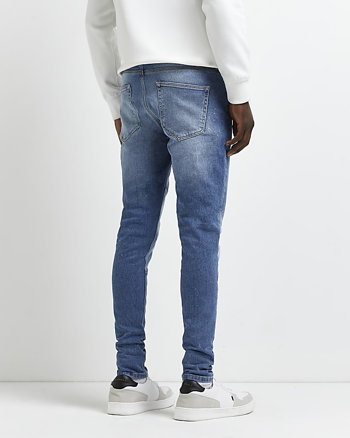 Blue spray on super skinny patchwork jeans