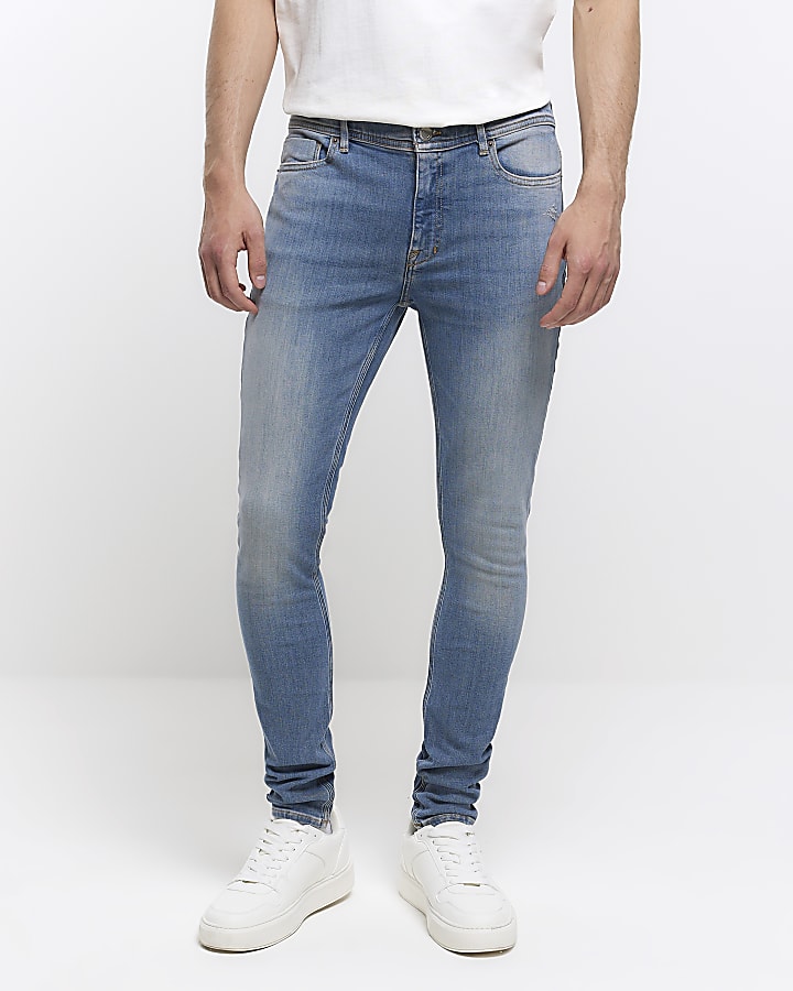 Blue super skinny fit spray on faded jeans