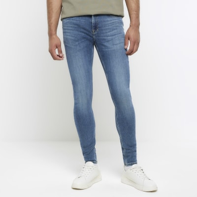 Mens spray best sale on skinny jeans