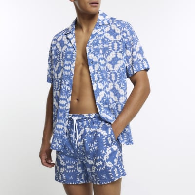Blue tie dye swim shorts River Island