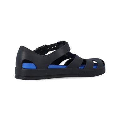 360 degree animation of product Boys black caged jelly sandals frame-13