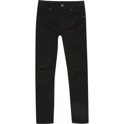 black ripped skinny jeans river island