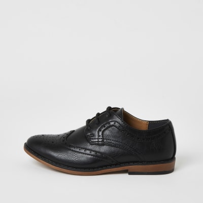 boys black brogues