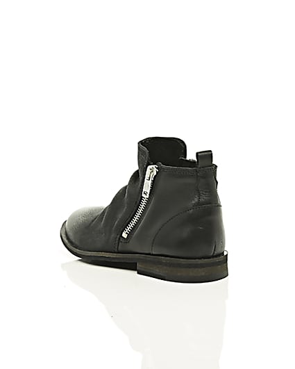 360 degree animation of product Boys black leather zip side chelsea boots frame-18